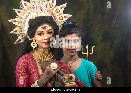 Un concept Agomoni photoshoot pour les enfants défavorisés Unloved. Maa Durga agomoni shoot concept.Culture indienne durga puja.. Banque D'Images