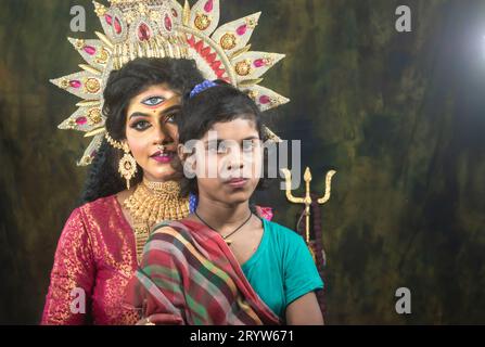 Un concept Agomoni photoshoot pour les enfants défavorisés Unloved. Maa Durga agomoni shoot concept.Culture indienne durga puja.. Banque D'Images