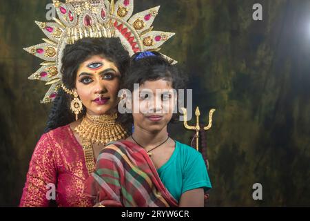 Un concept Agomoni photoshoot pour les enfants défavorisés Unloved. Maa Durga agomoni shoot concept.Culture indienne durga puja.. Banque D'Images