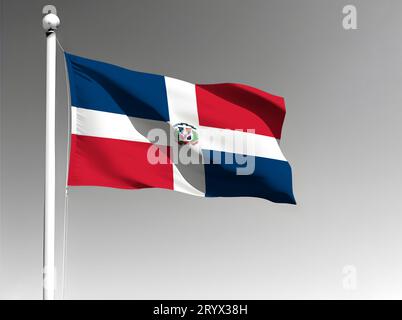 Drapeau national de la République dominicaine isolé ondulant sur fond gris Banque D'Images