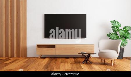 TV au-dessus de l'armoire en bois dans une pièce vide moderne avec tapis de plantes sur fond en bois. Thème de style japonais. Architecture et int Banque D'Images