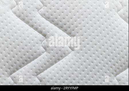 Gros plan du matelas blanc texture background. Mobilier et matériel concept. Literie confortable divan mou Banque D'Images