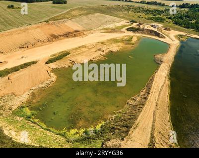 Paysage de sable et processus d'exploitation minière et de production de produits Banque D'Images