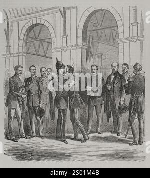 Guerre franco-prussienne (1870-1871). Le roi Guillaume Ier arrivant d'EMS, à la gare de Berlin, reçoit la nouvelle de la déclaration de guerre française (19 juillet 1870). Après l'avoir lu, il embrasse le prince royal, qui l'attendait avec Bismarck et les généraux Helmuth von Moltke, Albrecht von Roon et Friedrich von Wrangel. Gravure. Historia de la Guerra de Francia y Prusia (histoire de la guerre entre la France et la Prusse). Volume I. publié à Barcelone, 1870. Banque D'Images