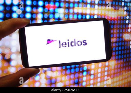 Pologne. 23 décembre 2024. Dans cette illustration photo, le logo de la société Leidos Holdings Inc est affiché sur l'écran d'un smartphone. Crédit : SOPA images Limited/Alamy Live News Banque D'Images