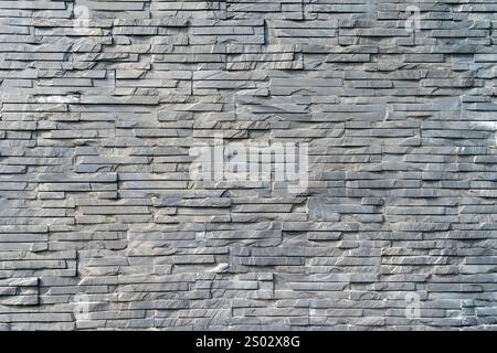 fond gris de mur de briques grunge rugueux Banque D'Images