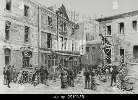 Londres, Angleterre. Vers 21 heures dans la soirée du 30 mai 1884, trois explosions de cartouches de dynamite ont eu lieu presque en même temps. La première a eu lieu à Scotland Yard, dans l'un des bâtiments de la police, près du quartier général et devant un établissement public appelé ''The Rising Sun'', qui a subi divers dommages matériels. Le policier de service à la porte du bâtiment de la police a été mutilé. L'explosion à Scotland Yard : apparition du poste de police et ''The Rising Sun'' après l'attaque. Gravure de Bernardo Rico (1825-1894). La Ilustracion Espanola y Ame Banque D'Images