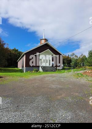 L'église anglicane Augustine à côté du parc communautaire de la famille Cranford à New Harbour, Terre-Neuve-et-Labrador, Canada Banque D'Images