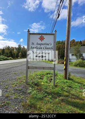 Signe de l'église anglicane Augustine à côté du parc communautaire de la famille Cranford à New Harbour, Terre-Neuve-et-Labrador, Canada Banque D'Images