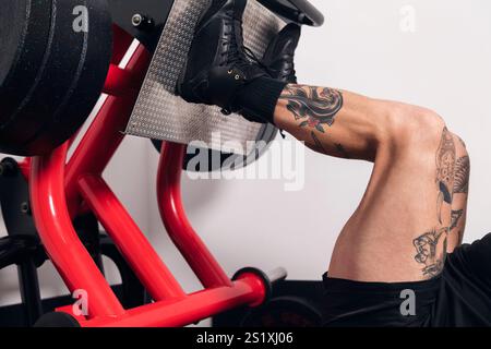 jambes de musculation sportive à la salle de gym Banque D'Images