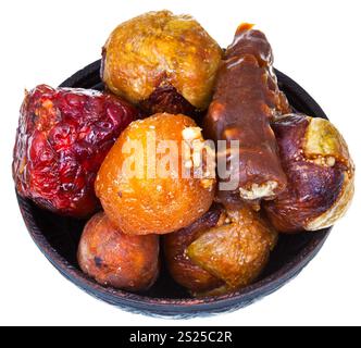 Fruits confits arménienne en peluche Bol en céramique isolé sur fond blanc Banque D'Images