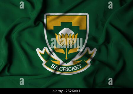 Pringsewu, Lampung 06 janvier 2025 ; texture d'un drapeau agitant avec le logo de l'équipe nationale sud-africaine de cricket. Illustration 3D. Banque D'Images
