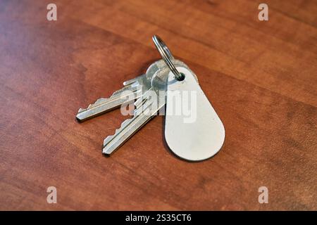 Clés pour l'appartement sur un bureau Banque D'Images