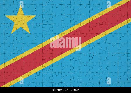 République démocratique du Congo drapeau est représenté sur un casse-tête pliée Banque D'Images