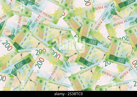 200 billets de roubles russes se trouve dans une grande pile. Fond conceptuel de la vie riche. Grosse somme d'argent. 200 billets de roubles russes se trouve dans une grande pile. Vie riche Banque D'Images