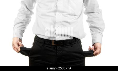 Homme d'affaires montrant sa poche vide isolé sur fond blanc. Homme d'affaires montrant sa poche vide Banque D'Images