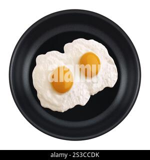 Oeufs dans une casserole isolés Banque D'Images