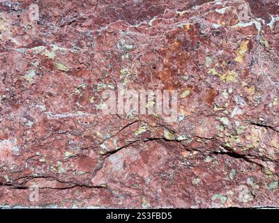 Détail, gros plan de la texture de la roche rouge. Banque D'Images