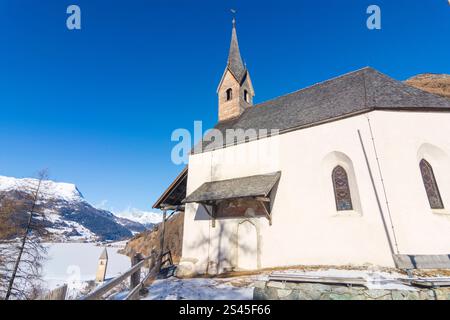 Chapelle Annakapelle, lac gelé Reschensee avec clocher submergé de l'église Alt-Graun Graun im Vinschgau Vinschgau Trentino-Tyrol du Sud Italie Banque D'Images