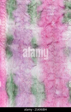 Contexte - textiles cousus peint à la main en tissu de soie rose et vert Banque D'Images