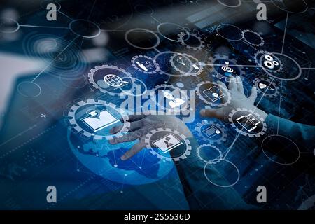 E-learning avec engrenages connectés diagramme connecté tableau de bord virtuel.main d'homme d'affaires travaillant avec la technologie moderne et l'effet de couche numérique comme Banque D'Images