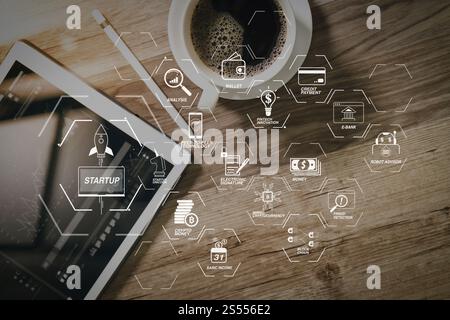 Organigramme de technologie financière et crypto-monnaie de minage de revenu de base avec diagramme virtuel UNICORN crypto-monnaie de démarrage de blockchain. Tasse à café et Banque D'Images