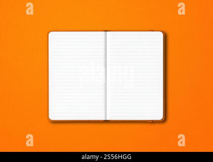 Maquette de carnet ligné ouvert orange isolée sur fond coloré. Carnet ligné ouvert orange isolé sur fond coloré Banque D'Images