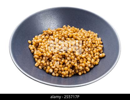 porridge cuit à partir de blé entier dans un bol gris isolé sur arrière-plan blanc Banque D'Images