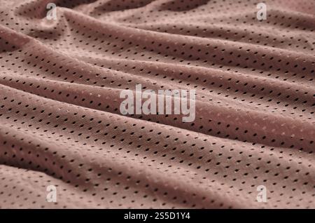 La texture des vêtements faits de fibres de polyester. Vêtements de sport pour la formation a un mesh texture de tissu de nylon extensible Banque D'Images