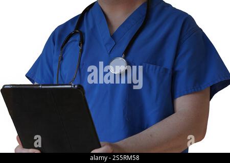 Gros plan professionnel de la santé dans les gommages bleus tenant la tablette, tableau Banque D'Images