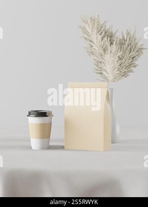 Un paquet utilisé pour le café avec des tasses à café. Banque D'Images