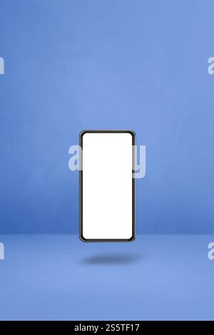 Smartphone vierge flottant sur un fond bleu. Illustration isolée 3D. Gabarit vertical. Smartphone flottant isolé sur bleu. Vertical Banque D'Images