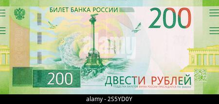 Monument aux navires coulés sur le nouveau billet de banque russe vert de 200 roubles gros plan. Monument aux navires coulés sur le nouveau billet de banque russe vert de 200 roubles Banque D'Images