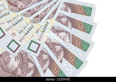 10 billets de zloty polonais se trouve isolé sur fond blanc avec un espace de copie empilé en forme d'éventail de gros plan. Concept de transactions financières. 10 Polonais Banque D'Images