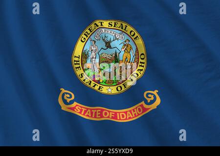 Drapeau de l'État américain de l'Idaho avec de grands plis ondulant de près sous la lumière du studio à l'intérieur. Les symboles officiels et les couleurs dans la bannière de tissu. Idaho état américain Banque D'Images