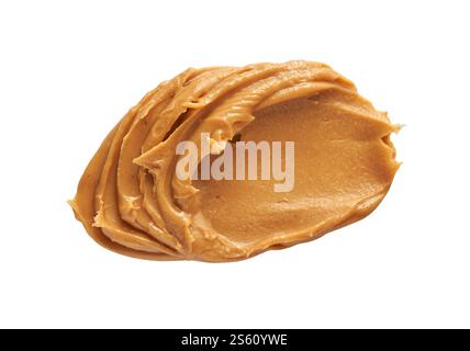 Tourbillon de beurre d'arachide crémeux sur fond noir dans le détail de texture haute résolution. Banque D'Images