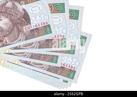 10 billets de zloty polonais se trouve en petit bouquet ou paquet isolé sur blanc. Maquette avec espace de copie. Concept d'affaires et de change de devises. 10 zloty polonais Banque D'Images