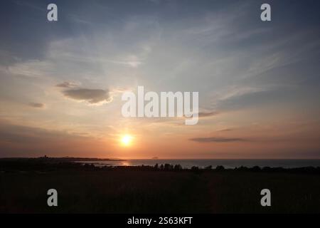 Coucher de soleil sur Firth of Forth depuis DunbarSunset Banque D'Images