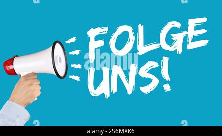 suivez-nous internet réseau social réseaux sociaux ordinateur main avec mégaphone Banque D'Images