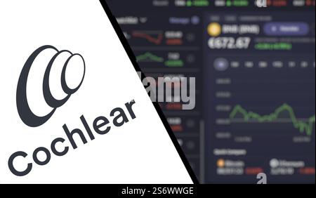 Cochlear logo is displayed on smartphone. Cochlear is a leading medical device company specializing in hearing solutions Banque D'Images