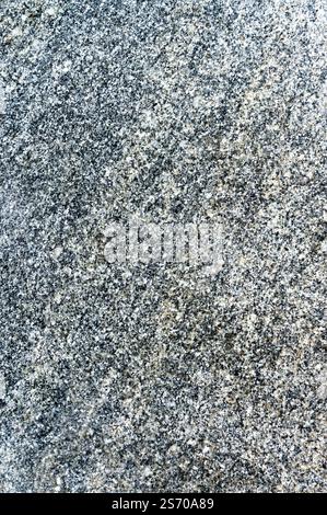 Gros plan de la texture de la pierre de granit pour l'arrière-plan ou la conception Banque D'Images