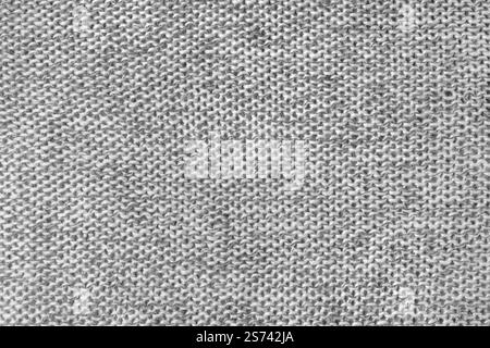 Tissu tricoté mélangé de couleur blanche et grise, texture de tissu de laine de cachemire. Fond de tissu tricoté, structure textile jersey, surface de tissu, nous Banque D'Images