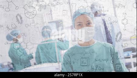 Image des équations chimiques sur divers chirurgiens en salle d'opération Banque D'Images