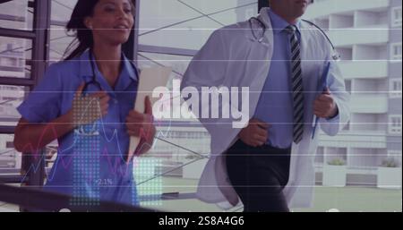 Image des diagrammes et du traitement des données sur divers médecins en cours d'exécution à l'hôpital Banque D'Images