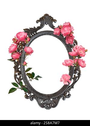 Cadre en métal orné de style baroque avec entrelacement rose fleurs roses découpe isolée Banque D'Images