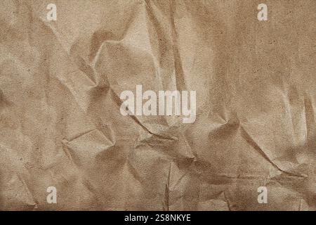 Fond de texture de papier brun froissé remplissant le cadre Banque D'Images
