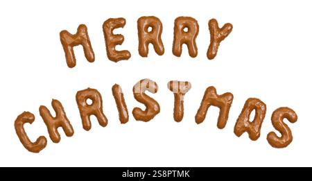 Un joyeux texte de noël écrit avec des biscuits isolés sur fond blanc Banque D'Images