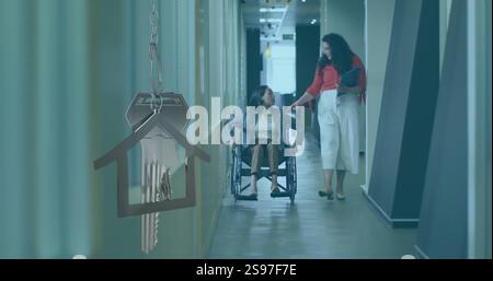 Image de la maison et de la clé sur la femme d'affaires biraciale en fauteuil roulant avec collègue dans le bureau Banque D'Images