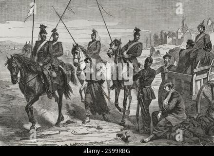 Guerre franco-prussienne (1870-1871). Les Uhlans de l'armée prussienne mènent un espion français capturé près de Metz au camp. Gravure par Capuz. Historia de la Guerra de Francia y Prusia (histoire de la guerre entre la France et la Prusse). Volume I. publié à Barcelone, 1870. Auteur : Tomás Carlos Capuz (1834-1899). Graveur espagnol. Banque D'Images