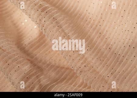 Concept avec tissu maille rose vagues. Esthétique de mode rétro. Peut utiliser comme fond de mariage. Design de fond luxueux Banque D'Images